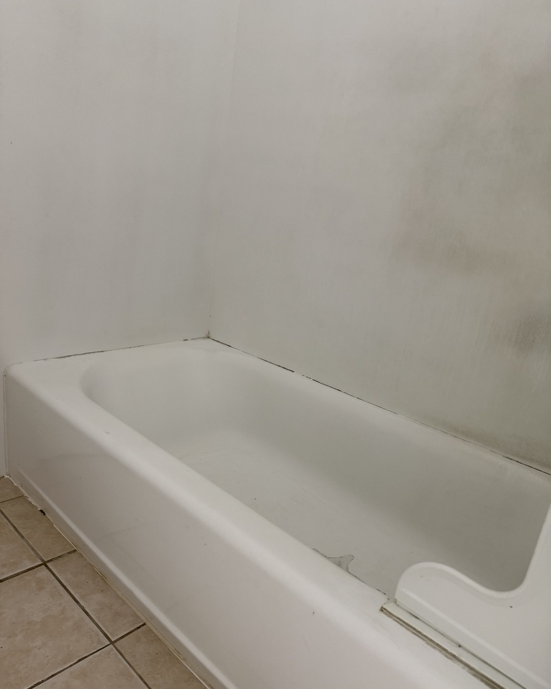 After — The same tub and tile before and after a Clean Route Systems refresh