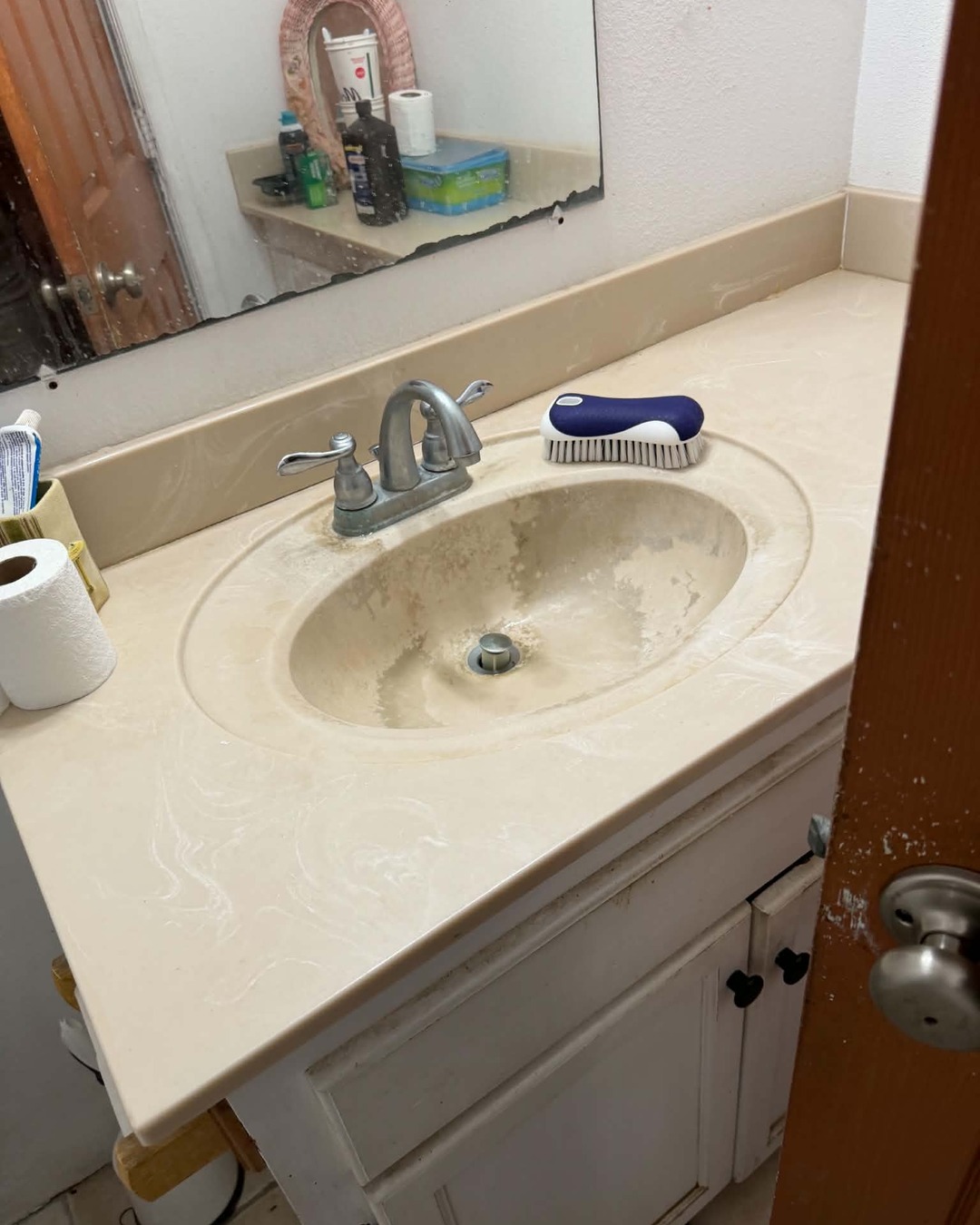 Before — The same bathroom sink before and after a Clean Route Systems deep clean